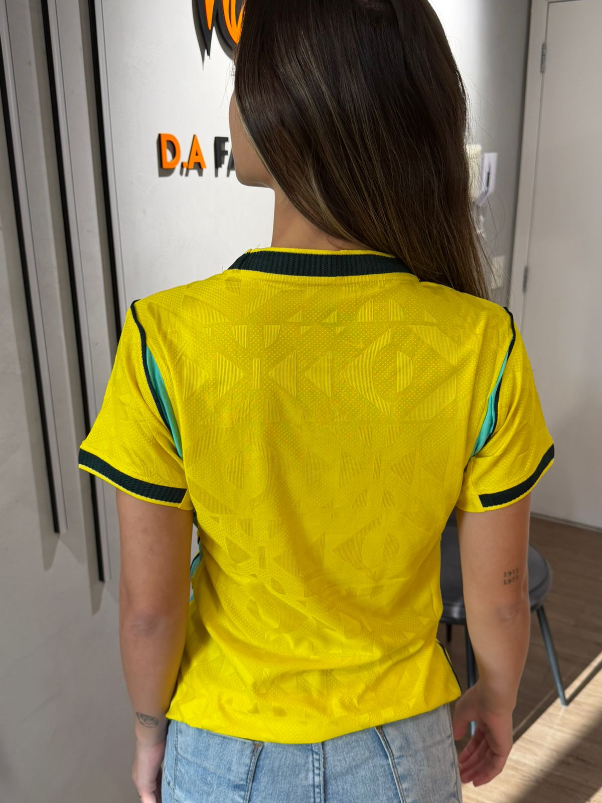 Brasil 2026 — Home · Feminina · Jogador — Amarela — vista alternativa
